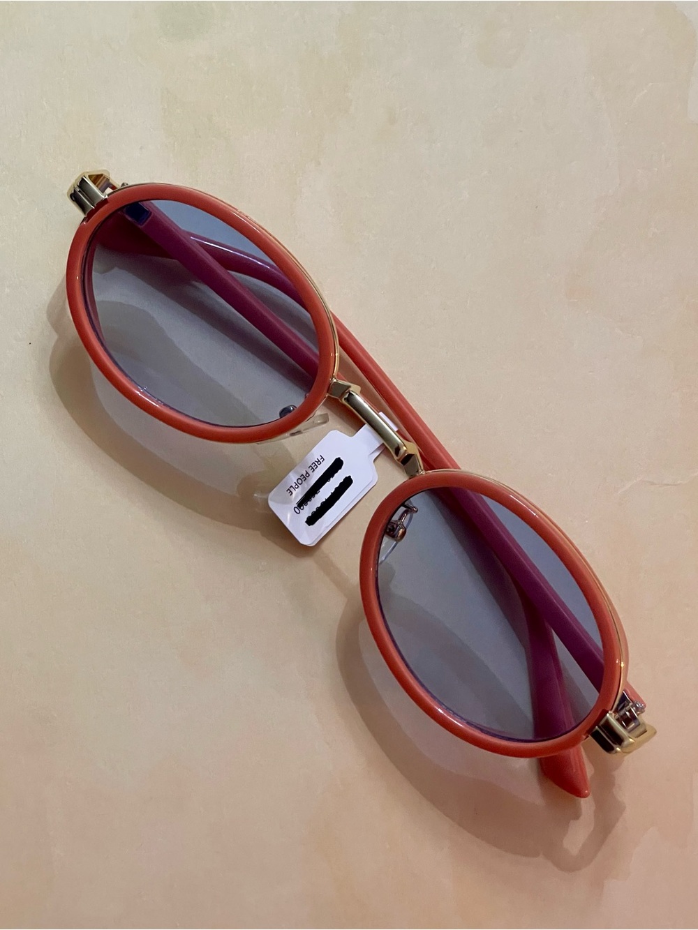 Free People Orange Slim Oval Sunglasses with Gold Accents and Blue Lenses
